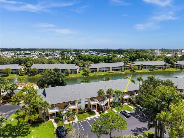 1190 Yesica Ann Cir Unit B205, Naples, FL 34110 - aerial perspective of suburban area with a nearby body of water