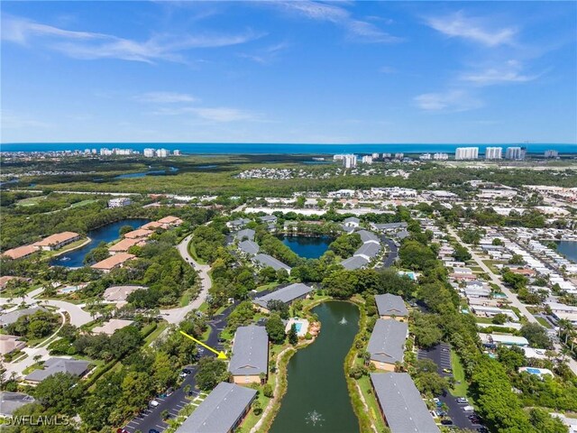 1190 Yesica Ann Cir Unit B205, Naples, FL 34110 - aerial view of property and surrounding area with a large body of water and nearby suburban area