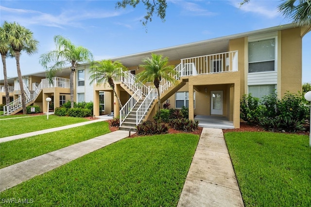1190 Yesica Ann Cir Unit B205, Naples, FL 34110 - view of building exterior featuring stairs