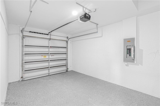 452/454 Loretta Ave S, Lehigh Acres, FL 33974 - garage featuring a garage door opener and electric panel