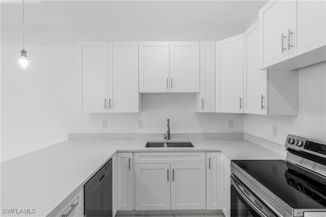 452/454 Loretta Ave S, Lehigh Acres, FL 33974 - kitchen featuring appliances with stainless steel finishes, a sink, and white cabinets