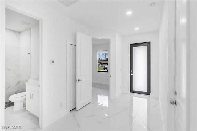 452/454 Loretta Ave S, Lehigh Acres, FL 33974 - full bathroom featuring marble tiled flooring, toilet, vanity, baseboards, and recessed lighting