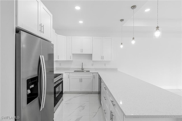 452/454 Loretta Ave S, Lehigh Acres, FL 33974 - kitchen featuring stainless steel appliances, a peninsula, a sink, light marble finish floors, and recessed lighting