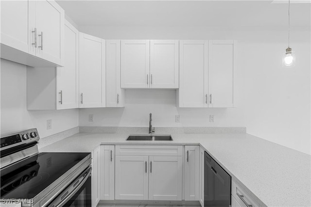 452/454 Loretta Ave S, Lehigh Acres, FL 33974 - kitchen with appliances with stainless steel finishes, a sink, white cabinets, light countertops, and decorative light fixtures