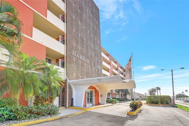 1766 Cape Coral Pkwy E Unit 410, Cape Coral, FL 33904 - view of apartment building / complex with uncovered parking