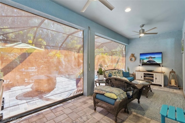 14559 Topsail Dr, Naples, FL 34114 - sunroom / solarium featuring a ceiling fan