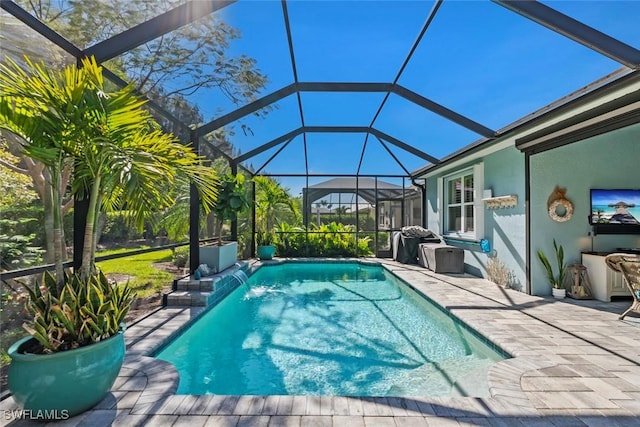 14559 Topsail Dr, Naples, FL 34114 - swimming pool with a patio and glass enclosure