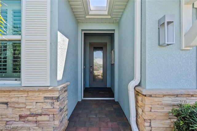 14559 Topsail Dr, Naples, FL 34114 - entrance to property with stucco siding