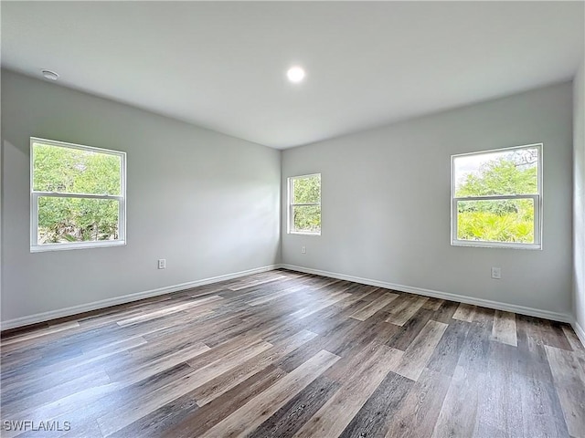Anthony Anthony Street E 912, Lehigh Acres, FL 33974 - unfurnished room featuring wood finished floors and baseboards