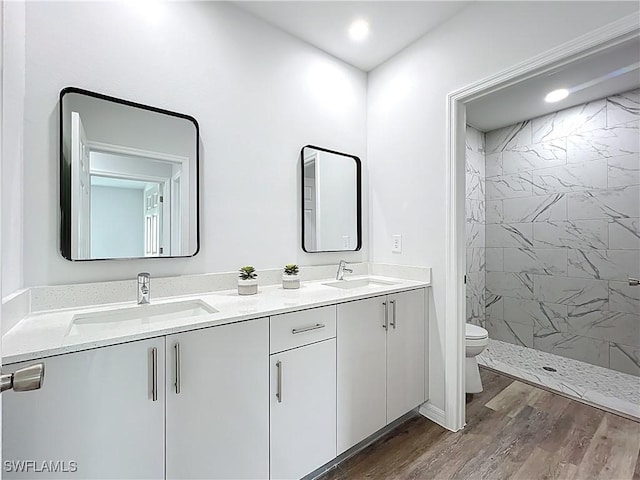 Anthony Anthony Street E 912, Lehigh Acres, FL 33974 - full bath with double vanity, wood finished floors, a tile shower, and recessed lighting