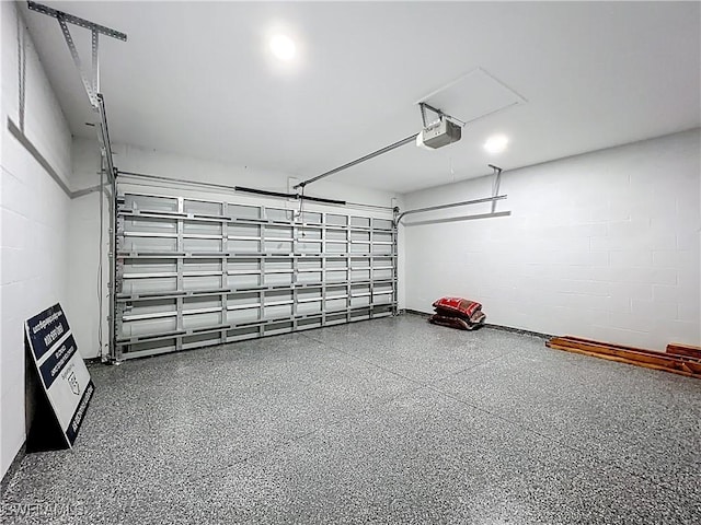 Anthony Anthony Street E 912, Lehigh Acres, FL 33974 - garage with a garage door opener and concrete block wall