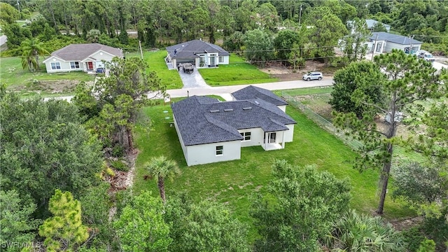 Anthony Anthony Street E 912, Lehigh Acres, FL 33974 - view of subject property featuring a heavily wooded area