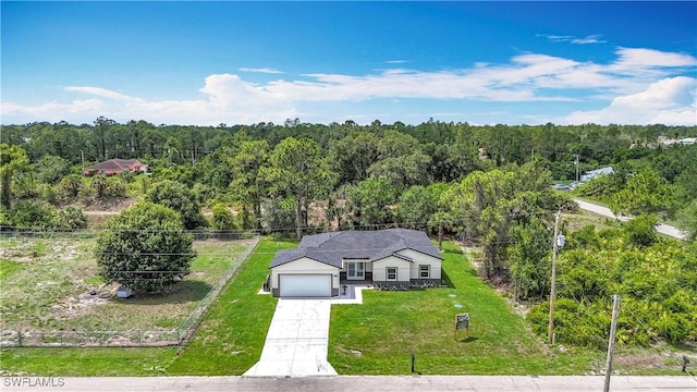 Anthony Anthony Street E 912, Lehigh Acres, FL 33974 - view from above of property with a heavily wooded area