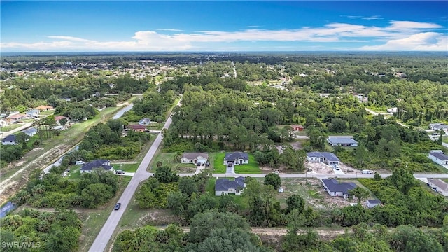Anthony Anthony Street E 912, Lehigh Acres, FL 33974 - aerial view of property and surrounding area with a forest and nearby suburban area