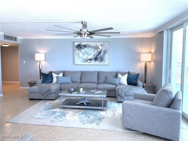 7150 Estero Blvd Unit 800, Fort Myers Beach, FL 33931 - living area featuring ornamental molding, tile patterned floors, ceiling fan, healthy amount of natural light, and a textured ceiling