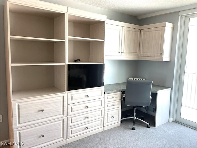 7150 Estero Blvd Unit 800, Fort Myers Beach, FL 33931 - office area featuring built in study area, light carpet, and a textured ceiling