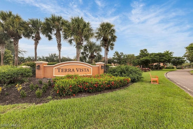3799 Costa Maya Way Unit 202, Estero, FL 33928 - community / neighborhood sign featuring a yard