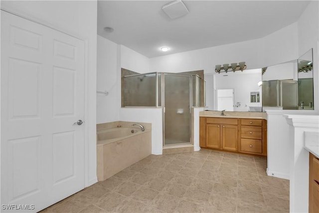 3799 Costa Maya Way Unit 202, Estero, FL 33928 - full bath with vanity, a stall shower, and a garden tub