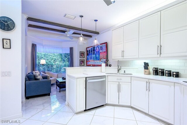 133 Colonade Cir, Naples, FL 34103 - kitchen with dishwasher, a sink, open floor plan, a peninsula, and white cabinets