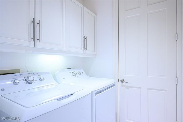 133 Colonade Cir, Naples, FL 34103 - washroom with independent washer and dryer and cabinet space