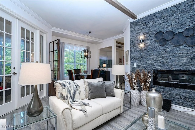 133 Colonade Cir, Naples, FL 34103 - living room featuring crown molding and a chandelier