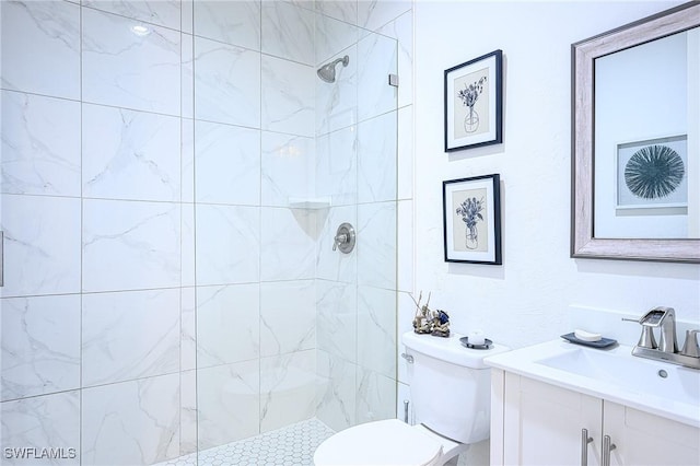 133 Colonade Cir, Naples, FL 34103 - full bath featuring toilet, vanity, and tiled shower