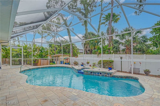 18370 Tulip Rd, Fort Myers, FL 33967 - view of swimming pool featuring a patio area, a fenced backyard, an in-ground hot tub, and a lanai