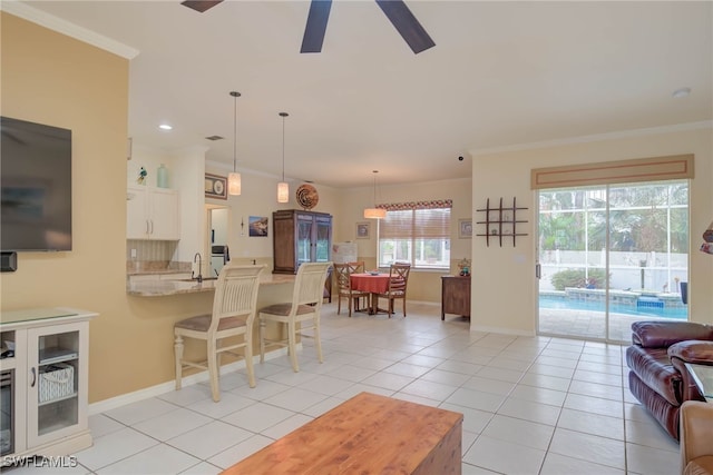 18370 Tulip Rd, Fort Myers, FL 33967 - living area with ceiling fan, baseboards, light tile patterned flooring, ornamental molding, and recessed lighting