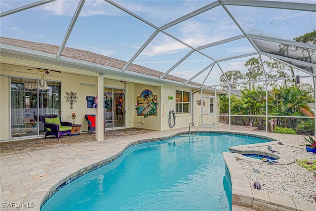 18370 Tulip Rd, Fort Myers, FL 33967 - swimming pool featuring ceiling fan, a patio, an in-ground hot tub, and a lanai