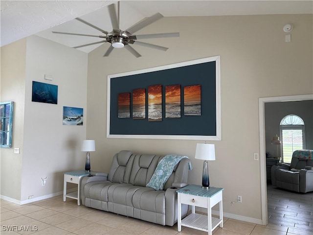 1118 Grove Dr, Naples, FL 34120 - living area with ceiling fan, lofted ceiling, and light tile patterned floors