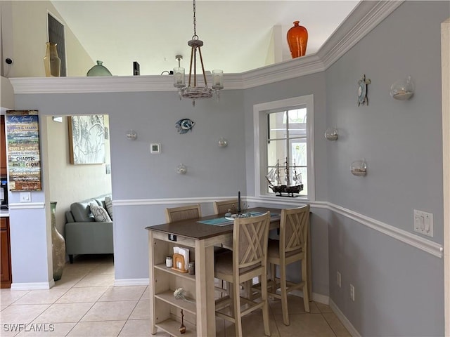 1118 Grove Dr, Naples, FL 34120 - dining room with light tile patterned floors and a chandelier