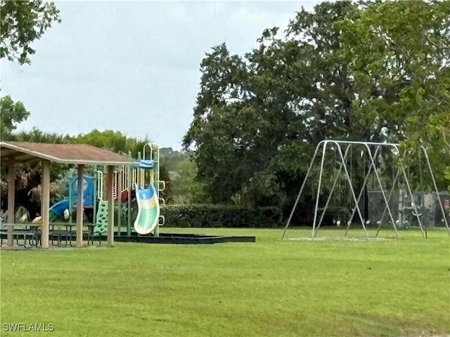 1118 Grove Dr, Naples, FL 34120 - community play area with a lawn