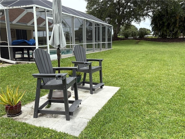 1118 Grove Dr, Naples, FL 34120 - view of green lawn with an outdoor pool, a patio, and a lanai
