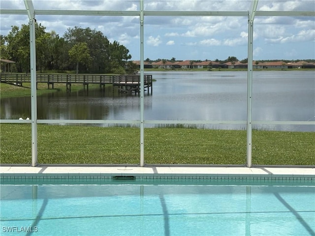 1118 Grove Dr, Naples, FL 34120 - outdoor pool featuring a water view and a yard
