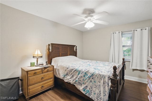 11580 Dean St Unit 582, Bonita Springs, FL 34135 - bedroom with wood finished floors, baseboards, and a ceiling fan