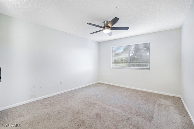 1205 Wildwood Lakes Blvd Unit 305, Naples, FL 34104 - carpeted empty room featuring a ceiling fan and a textured ceiling