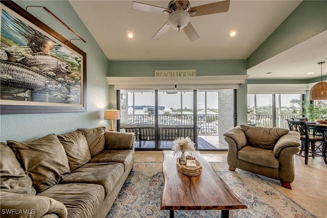 16641 Stringfellow Rd Unit 506, Bokeelia, FL 33922 - living area featuring light tile patterned floors, ceiling fan, recessed lighting, and lofted ceiling