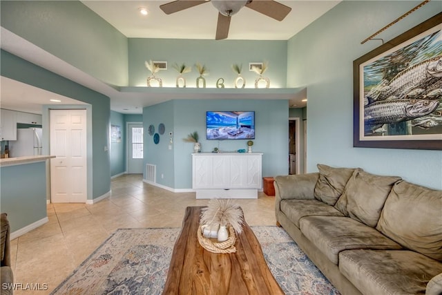 16641 Stringfellow Rd Unit 506, Bokeelia, FL 33922 - living room featuring light tile patterned floors, ceiling fan, baseboards, and recessed lighting