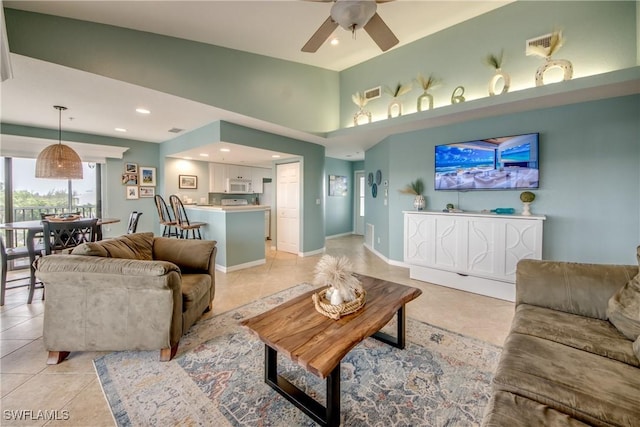 16641 Stringfellow Rd Unit 506, Bokeelia, FL 33922 - living area featuring light tile patterned floors, ceiling fan, and recessed lighting