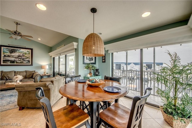 16641 Stringfellow Rd Unit 506, Bokeelia, FL 33922 - dining space featuring light tile patterned floors, vaulted ceiling, ceiling fan, and recessed lighting