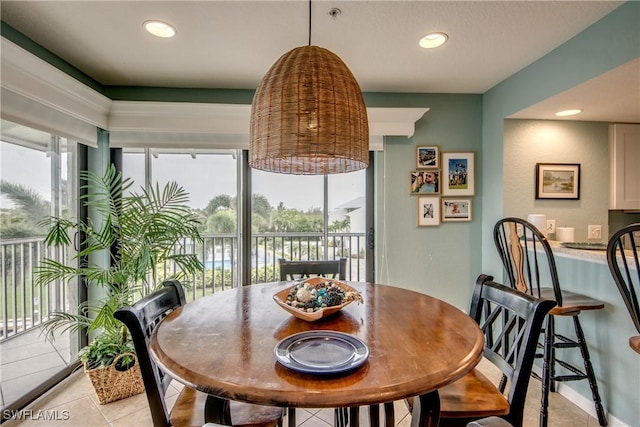 16641 Stringfellow Rd Unit 506, Bokeelia, FL 33922 - dining room with light tile patterned floors and recessed lighting