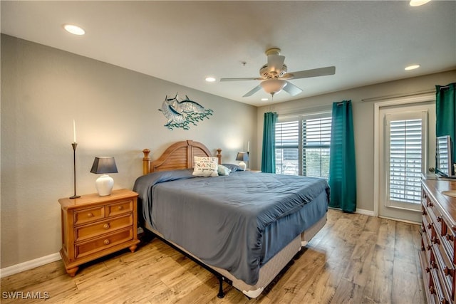 16641 Stringfellow Rd Unit 506, Bokeelia, FL 33922 - bedroom with light wood-style flooring, baseboards, ceiling fan, recessed lighting, and access to outside