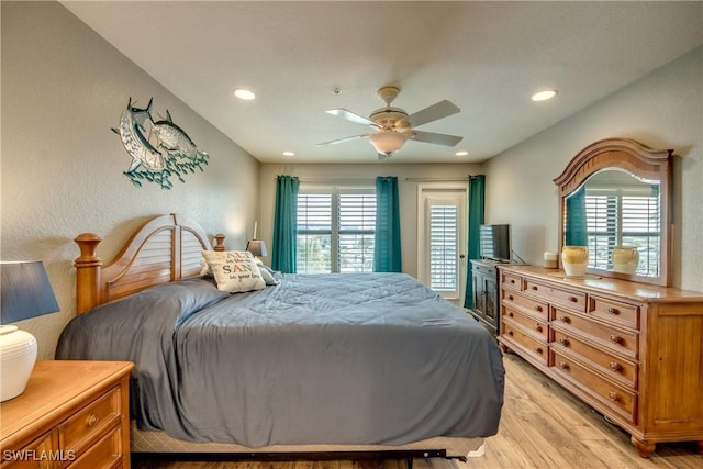 16641 Stringfellow Rd Unit 506, Bokeelia, FL 33922 - bedroom with light wood-type flooring, recessed lighting, and ceiling fan