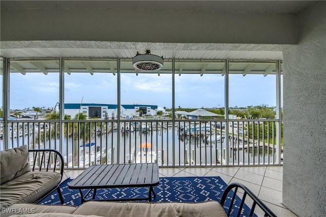 16641 Stringfellow Rd Unit 506, Bokeelia, FL 33922 - sunroom featuring a water view