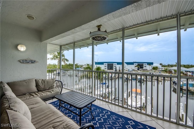 16641 Stringfellow Rd Unit 506, Bokeelia, FL 33922 - sunroom / solarium featuring a water view