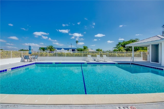 16641 Stringfellow Rd Unit 506, Bokeelia, FL 33922 - community pool featuring a patio