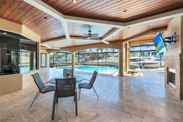 1658 Mcilvaine Ct, Marco Island, FL 34145 - view of patio / terrace with an outdoor pool and glass enclosure