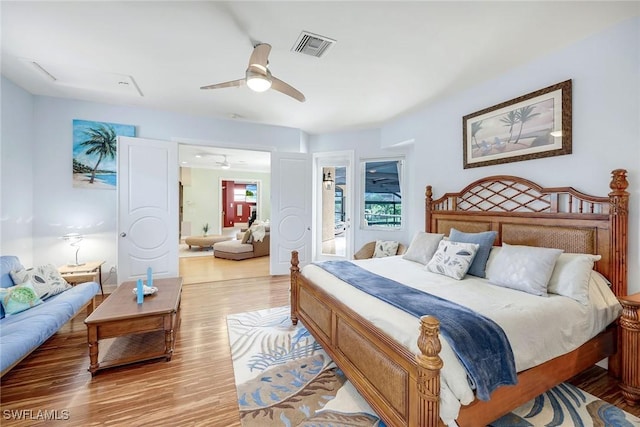 1658 Mcilvaine Ct, Marco Island, FL 34145 - bedroom featuring light wood-style floors and ceiling fan