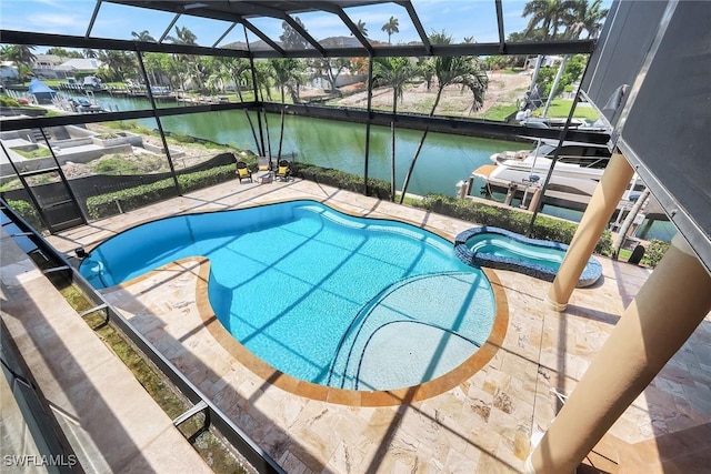 1658 Mcilvaine Ct, Marco Island, FL 34145 - view of pool featuring a pool with connected hot tub, a water view, and a lanai