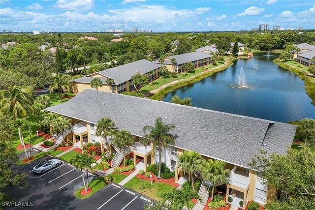 1250 Yesica Ann Cir Unit E106, Naples, FL 34110 - bird's eye view of a nearby body of water and a tree filled landscape